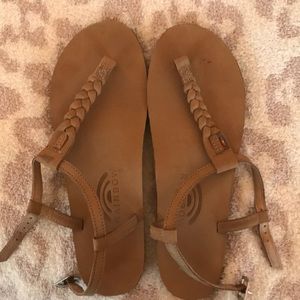 Rainbow braided flip flops